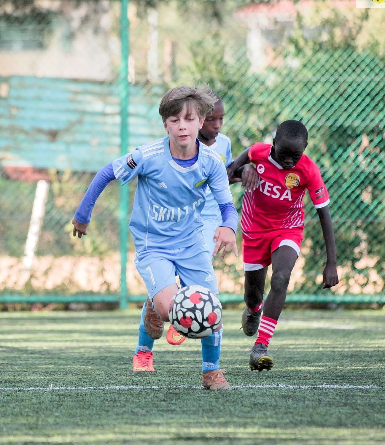 Lorenzo playing football during the early days of Skillz FC Academy