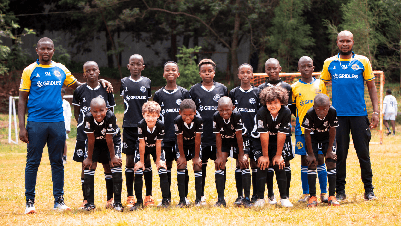 Skillz FC Academy team and coaches standing together