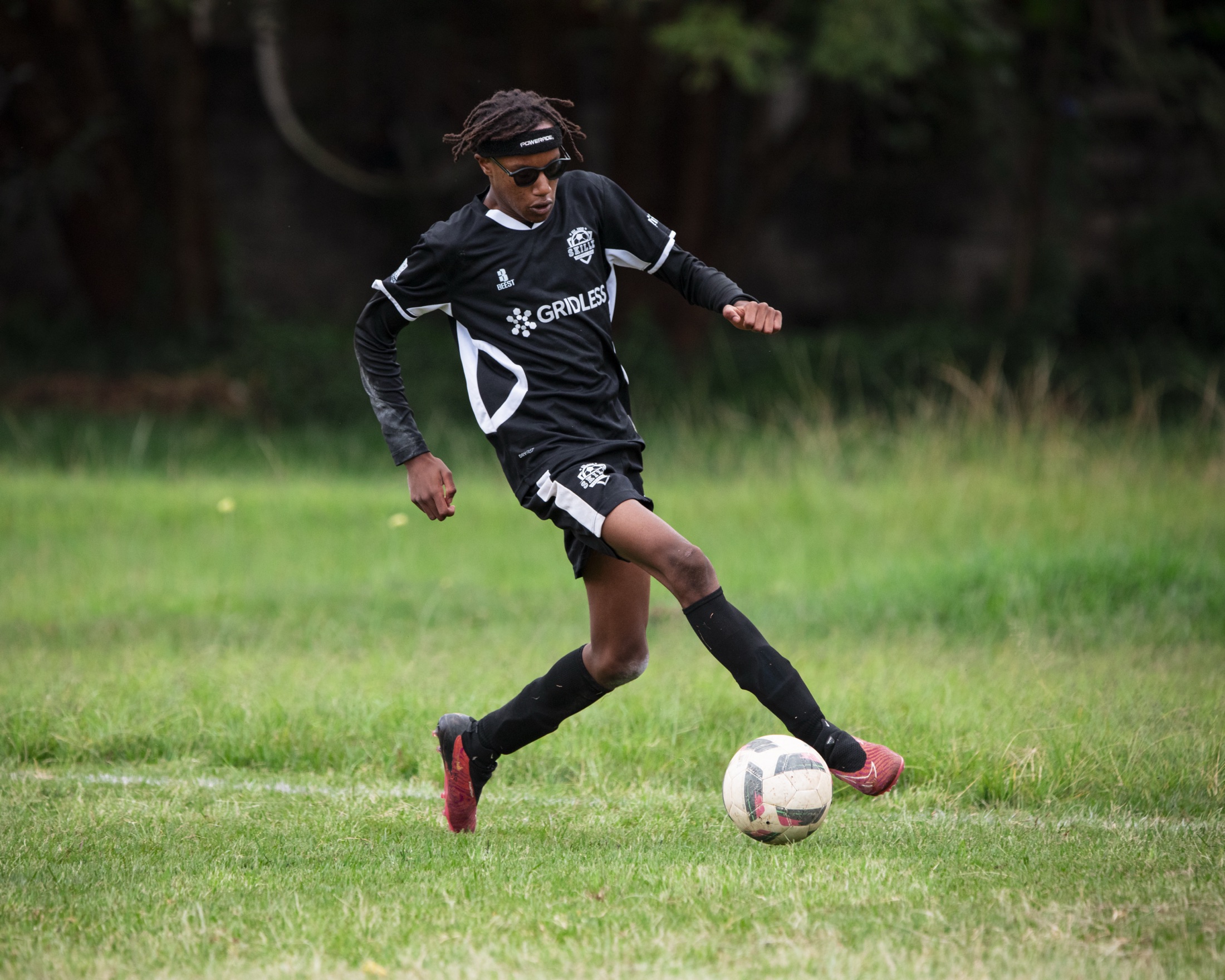 Skillz FC Academy player striking the ball